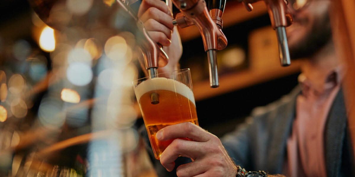 pouring craft beer in a bar