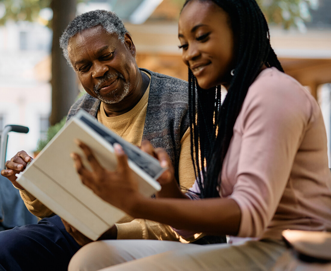 End-of-Life-Doula at UVM photo of a couple sitting on a bench