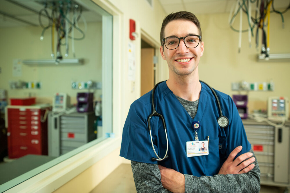 Matt Saunders smiling in a medical setting