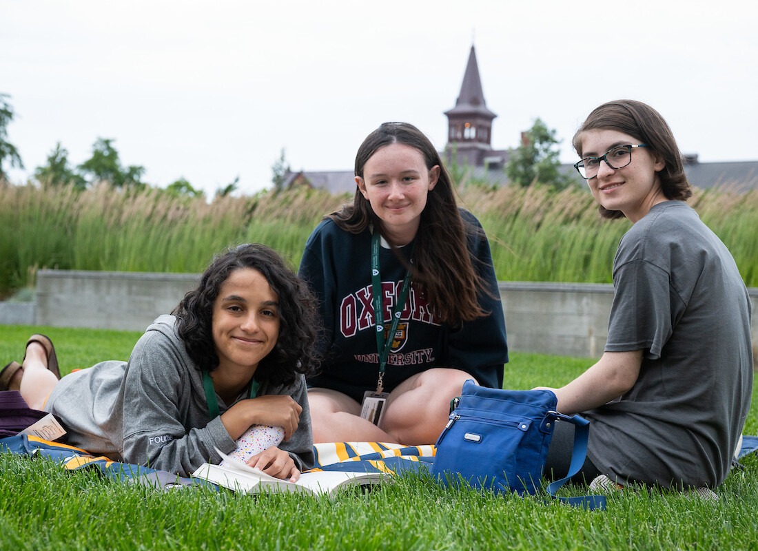 Summe Academy students on the lawn on campus