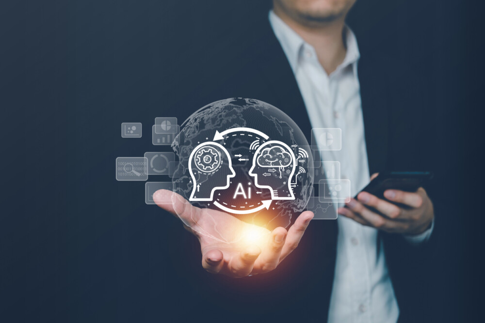 AI technology graphic showing a person in a suit jacket with no tie holding a bright sphere in their hand