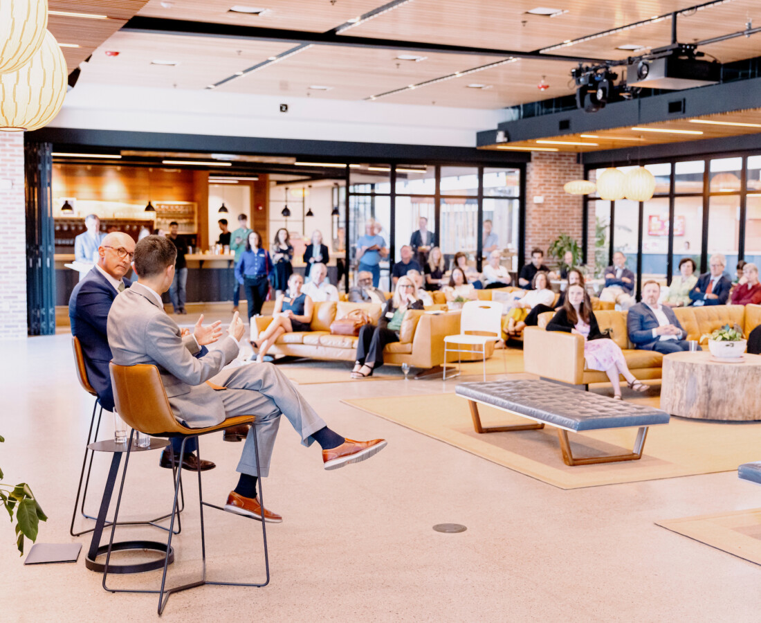 UVM VP of Research talks with a group of entrepreneurs and innovators