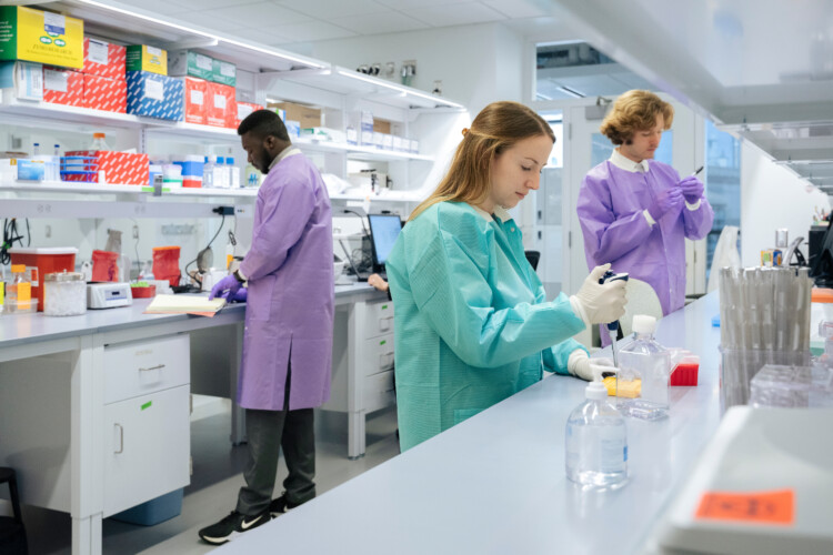Technicians working in a lab setting